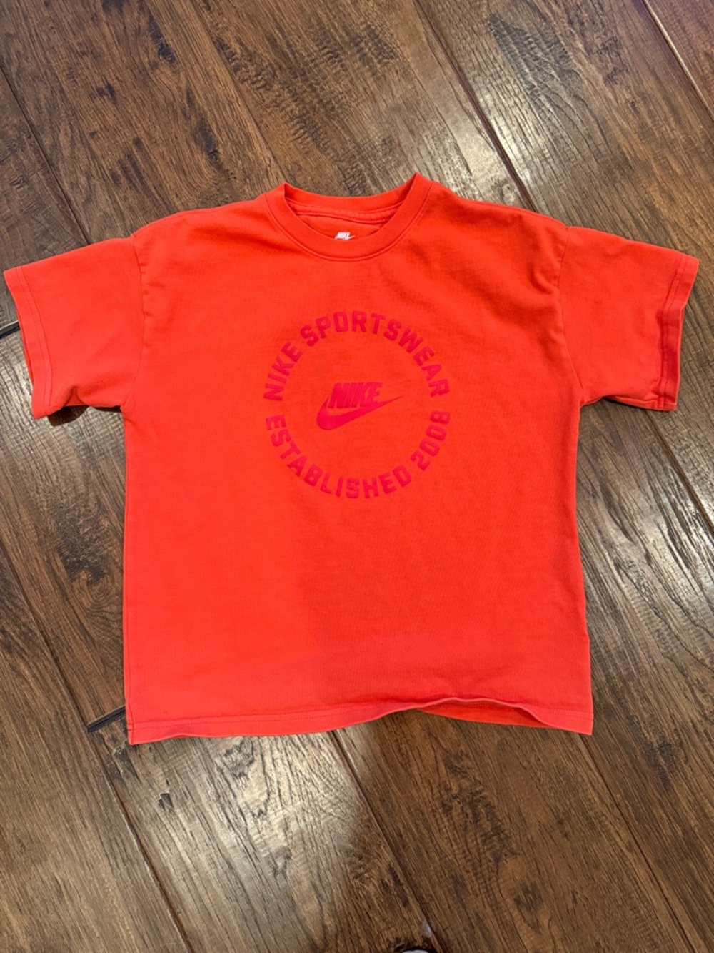 Nike Kids Red Short-Sleeve Graphic Tee. Size MEDIUM. Loose fit. Never worn.